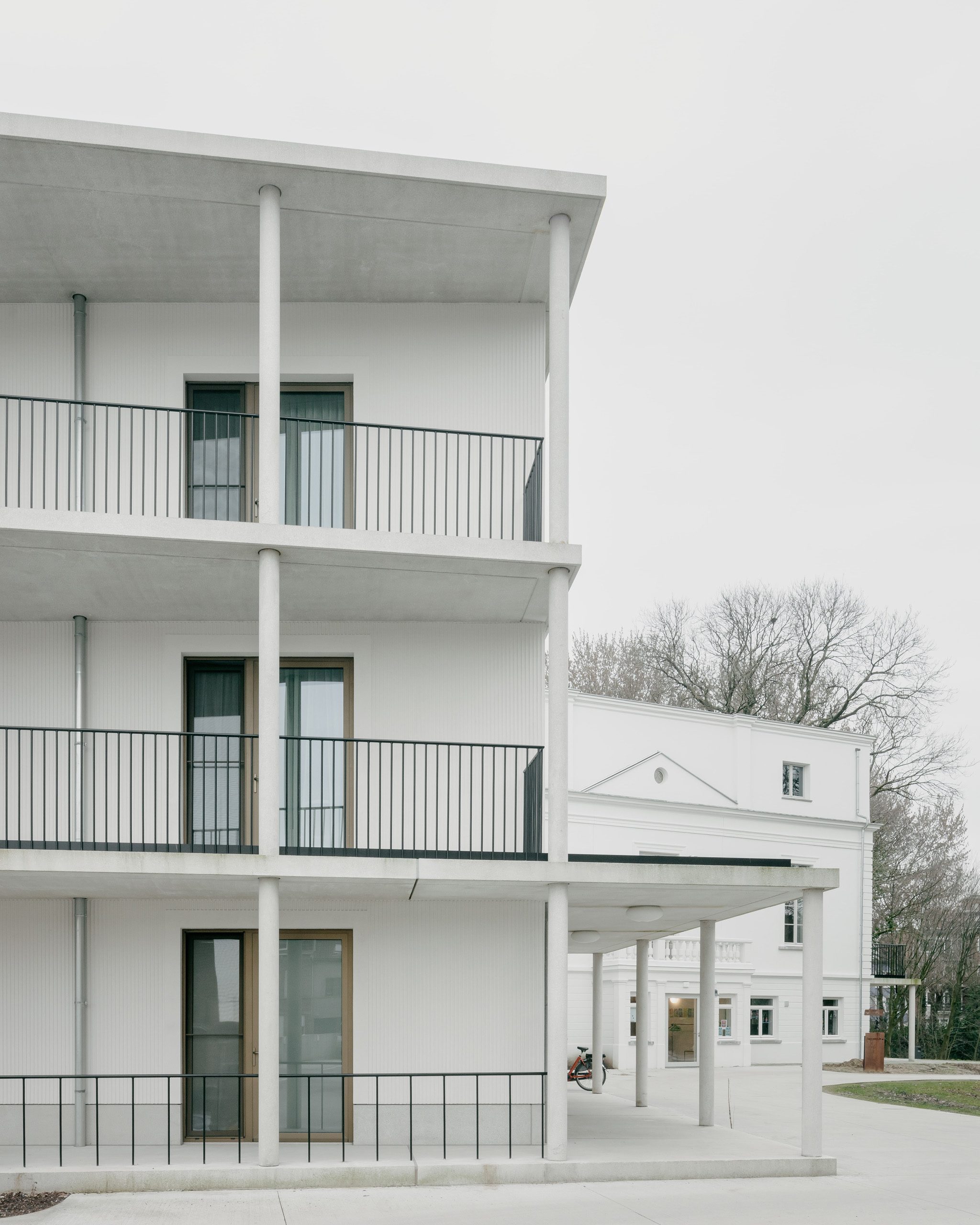 Studio Jan Vermeulen - De Korenbloem Care home kortrijk balconies white concrete historical villa Studio Jan Vermeulen, Architecture & Urbanism