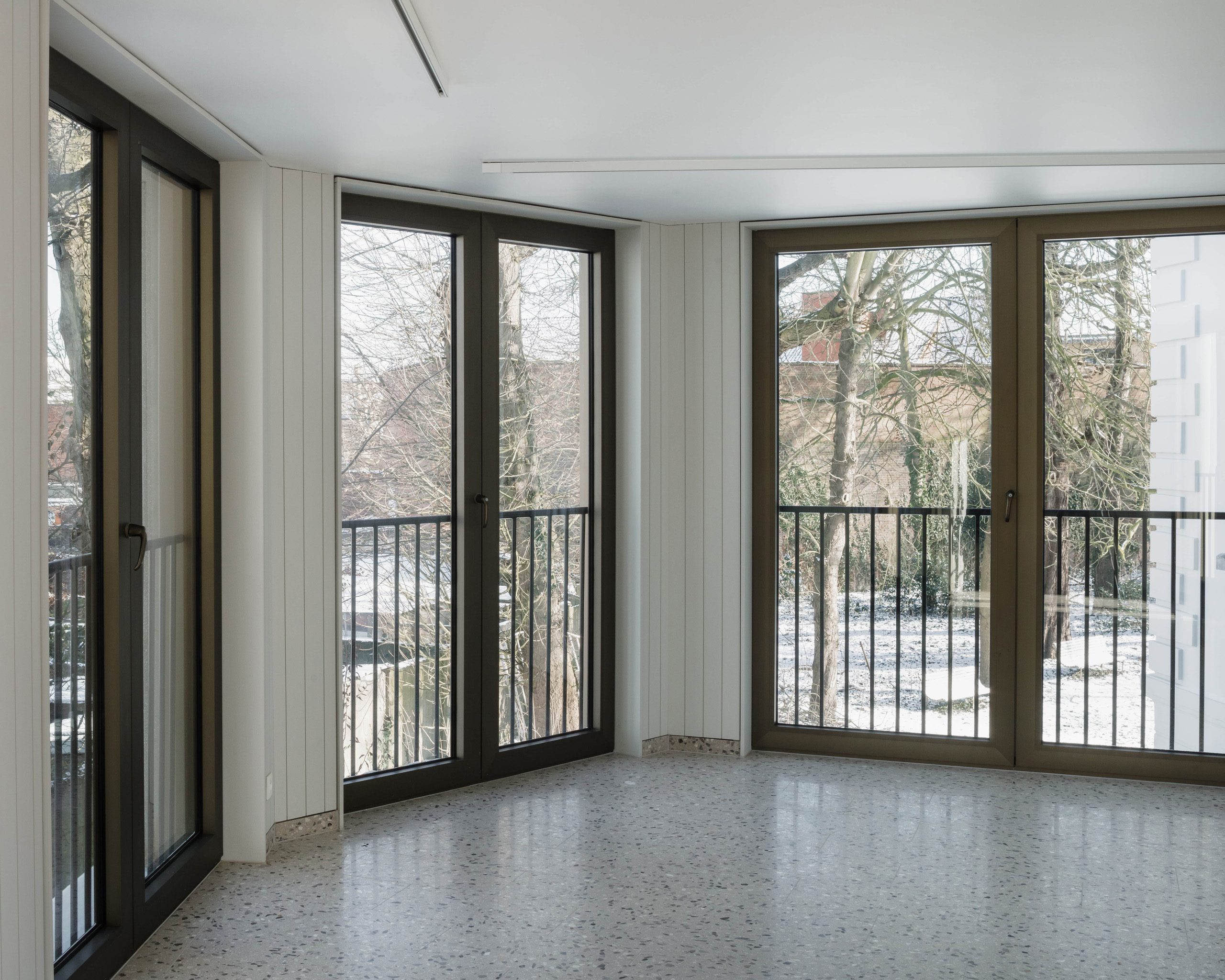 Studio Jan Vermeulen - De Korenbloem Care home kortrijk balconies white concrete plaster Studio Jan Vermeulen, Architecture & Urbanism